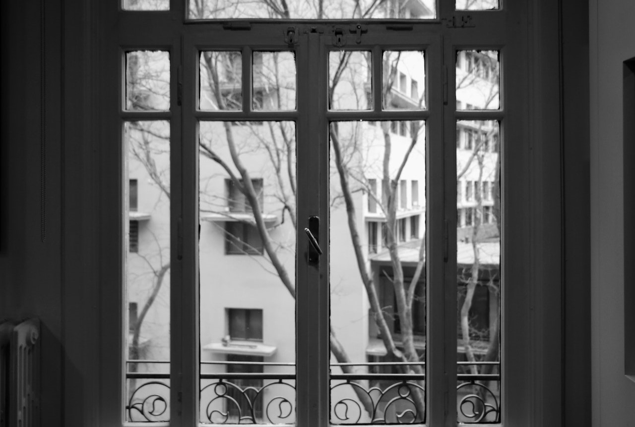 black and white photo of a window